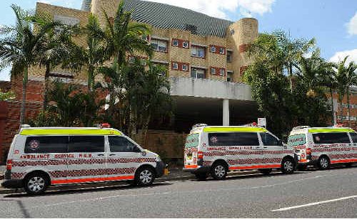 Ambulance vehicles wait outside the Lismore Base Hospital. Ambulance vehicles wait outside the Lismore Base Hospital.